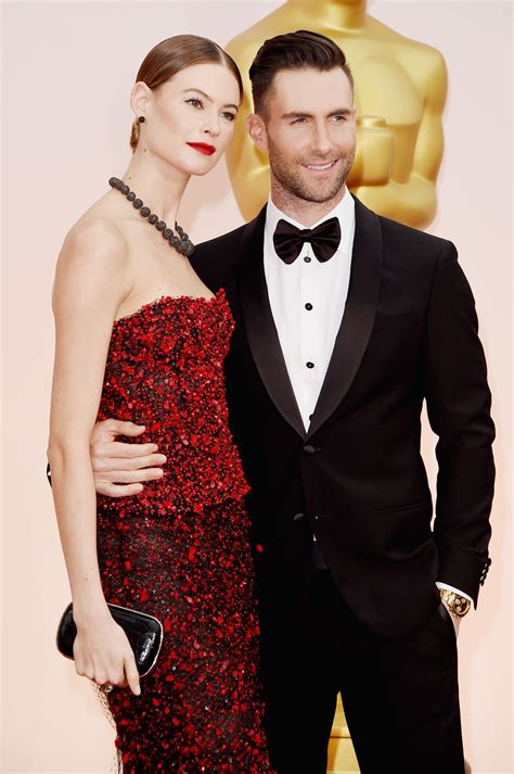 adam levine wife nationality.